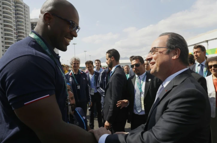 Teddy Riner et François Hollande au village olympique le 4 août 2016 à Rio