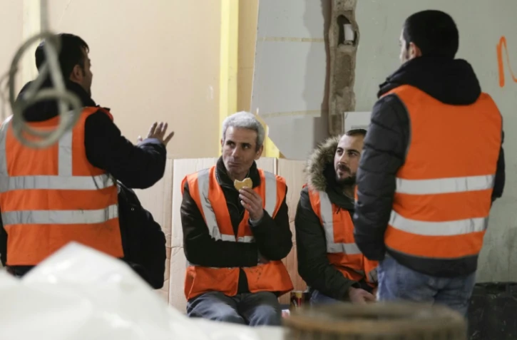 Des ouvriers travaillant à la rénovation du métro  le 25 janvier 2017 à la station Châtelet-Les Halles à Paris
