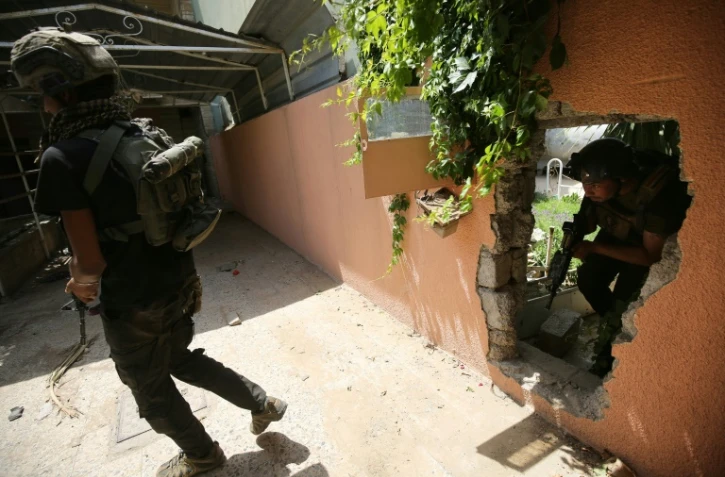 Les troupes irakiennes contrĂ´lent chaque immeuble dans le quartier de al-Islah al-Zaraye dans l'ouest de Mossoul, le 10 mai 2017