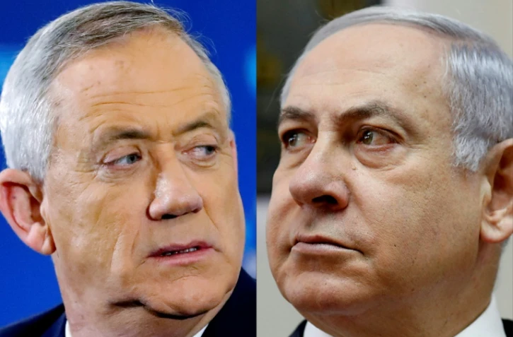 Combinaison de photos du Premier ministre israélien Benjamin Netanyahu (D), le 10 mars 2019 à Jérusalem, et de son principal rival, le général Benny Gantz (G), le 1er avril 2019 