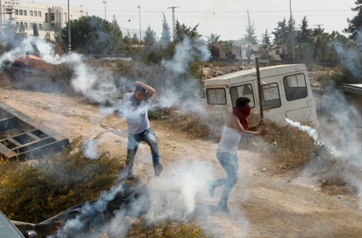 Etudiants palestiniens lors de heurts le 18 octobre 2015 à Hebron