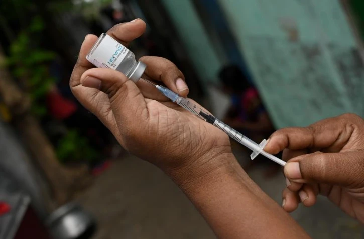   Ces images ne prouvent pas la présence de "parasites" vecteurs d'une maladie tropicale dans les vaccins
