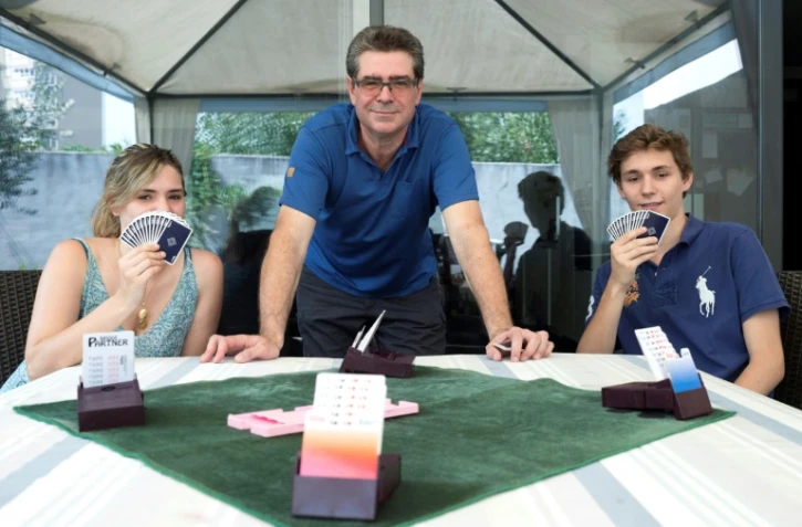 François Combescure, sa fille Sarah et son fils Baptiste à Villeurbanne, près de Lyon, en France, le 3 août 2017