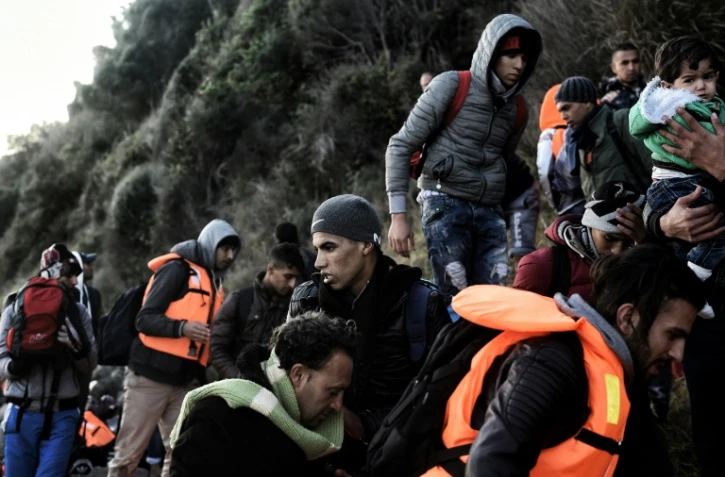 Des migrants à leur arrivée le 9 novembre 2015 sur l'île de Lesbos