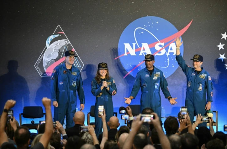 Cérémonie de bienvenue pour les astronautes d'Artemis II, le 11 avril 202- à Houston (de gauche à droite: le Canadien Jeremy Hansen, Christina Koch, Victor Glover et le commandant Reid Wiseman)