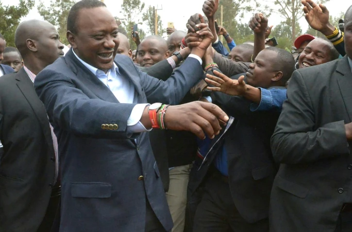 Le président kényan Uhuru Kenyatta à la sortie d'un bureau de vote à Gatundu le 8 août 2017