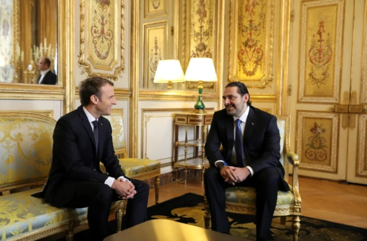 Le président Emmanuel Macron (G) et Le Premier ministre libanais démissionnaire Saad Hariri, le 18 novembre 2017 à L'Elysée à paris 