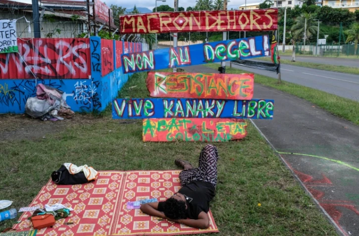 Un indépendantiste dans le quartier de Rivière Salée à Nouméa, le 12 juin 2024