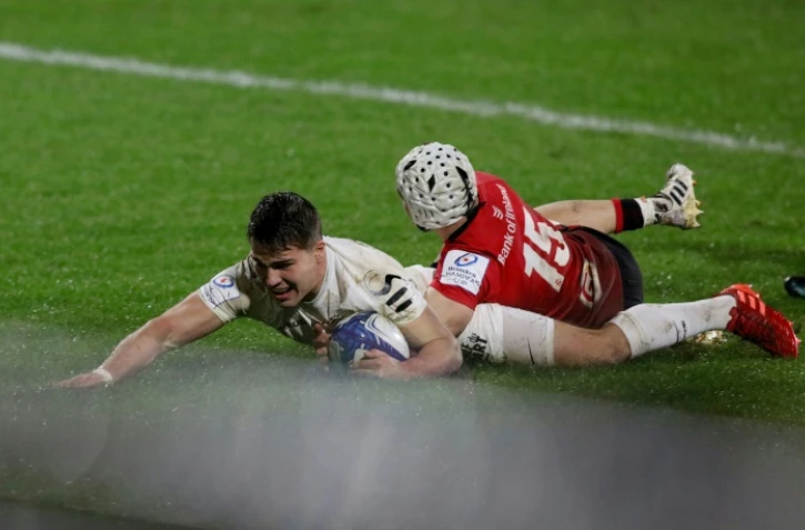 Le demi de mêlée de Toulouse, Antoine Dupont, marque un essai lors du match de groupes de la Coupe d'Europe en Ulster, à Belfast, le 11 décembre 2020