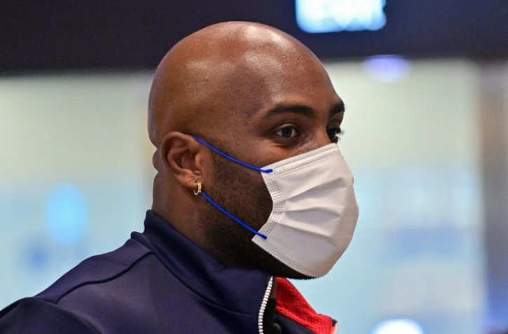 Le judoka français Teddy Riner arrive à l'aéroport de Tokyo le 26 juillet 2021