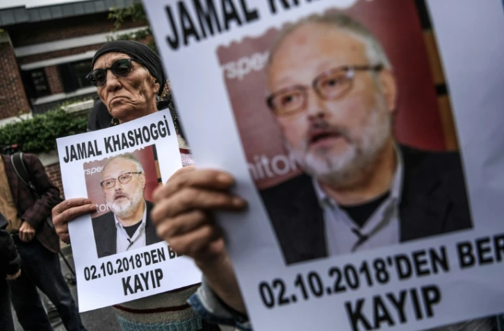 Des portraits du journaliste saoudien Jamal Khashoggi lors d'une manifestation devant le consulat saoudien, le 9 octobre 2018 à Istanbul, en Turquie