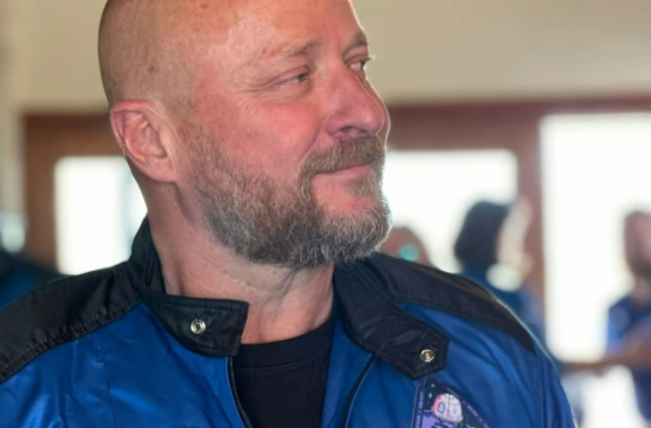 Photo non datée diffusée le 17 mai 2024 du Français Sylvain Chiron au Texas, portant un vêtement avec le nom de sa mission, NS-25