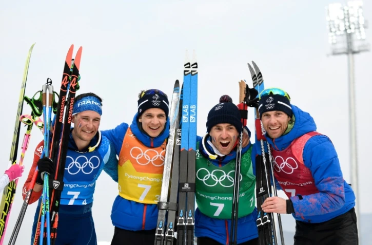 (g à d) Adrien Backscheider, Clément Parisse, Maurice Manificat et Jean-Marc Gaillard heureux en bronze sur le relais 4x10 km de ski de fond, à Pyeongchang, le 18 février 2018