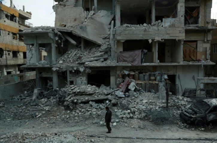 Des immeubles détruits par les bombardements du régime syrien à Douma, dans la Ghouta orientale, le 25 février 2018