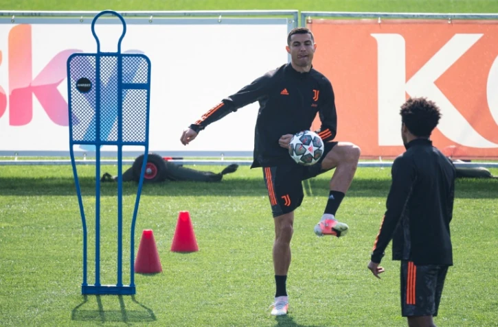 Cristiano Ronaldo et ses coéquipiers de la Juventus préparent le 8e de finale retour de C1 contre Porto au centre d'entraînement du club à Turin, le8 mars 2021