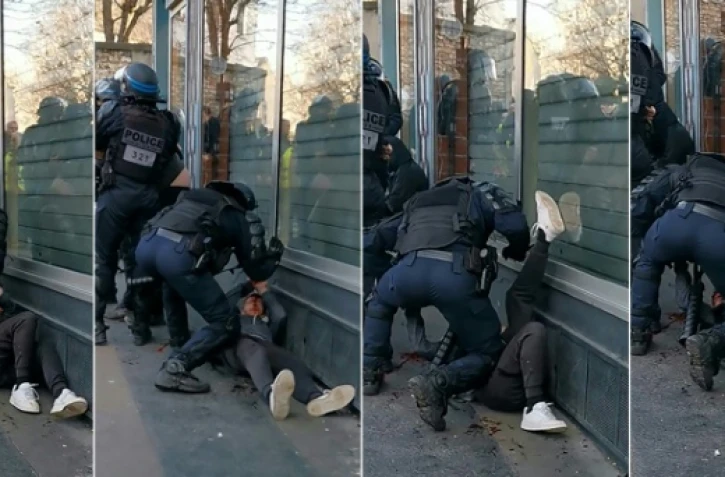 Montage de photos créé le 19 janvier 2020 à partir d'une vidéo d'un manifestant et montrant un policier frappant un homme, en marge de la manifestation des "gilets jaunes" à Paris, le 18 janvier 2020