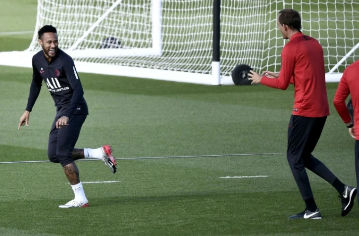Neymar lors d'une séance d'entraînement du PSG sous le regard du technicien allemand Thomas Tuchel, au Camp des Loges, le 24 septembre 2019