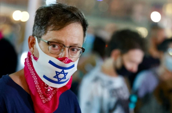 Un manifestant anti-confinement à Tel-Aviv le 17 septembre