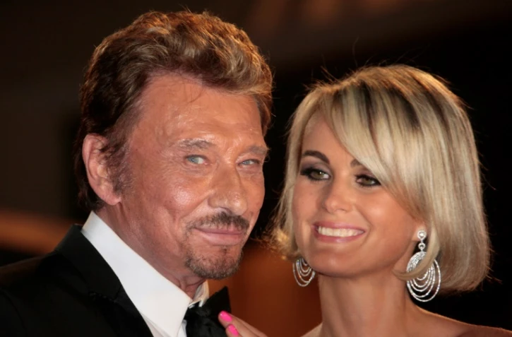 Johnny Hallyday et sa femme Laeticia après la projection du film "Vengeance" au Festival de Cannes le 17 mai 2009