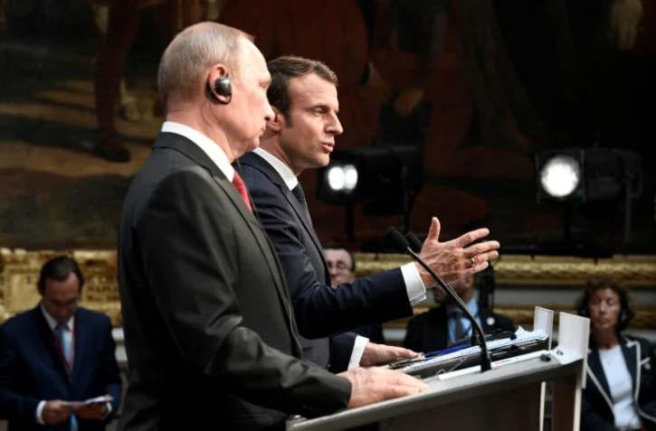 Le président français Emmanuel Macron et son homologue russe Vladimir Poutine lors d'une conférence de presse au Château de Versailles, le 29 mai 2017