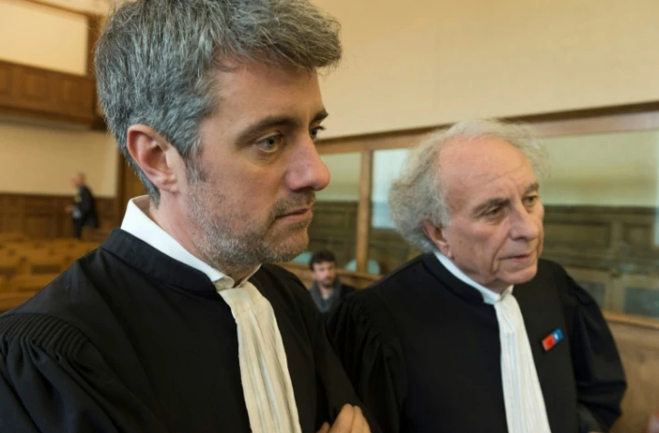 L'avocat de Cécile Bourgeon Renaud Portejoie (G), au Puy-en-Velay le 30 janvier 2018