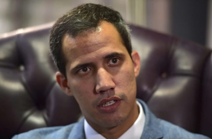 Juan Guaido qui s'est autoproclamé président du Venezuela s'exprime lors d'un entretien avec l'AFP à Caracas, le 8 février  2019