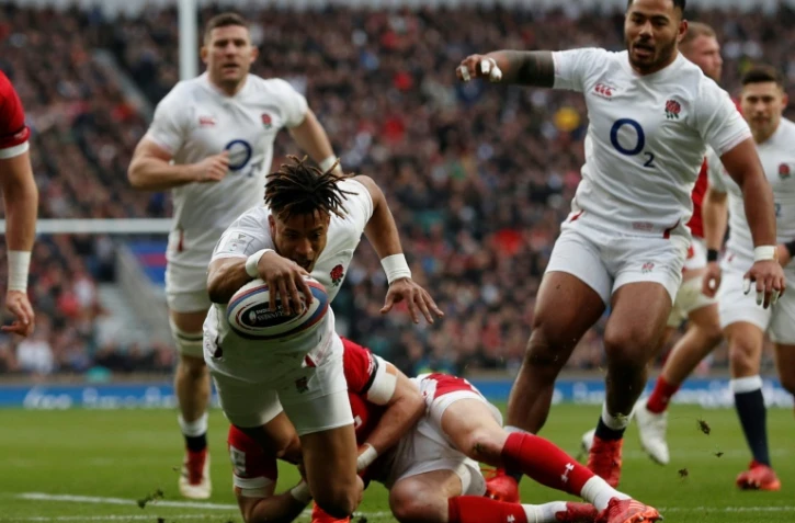 L'arrière Anthony Watson marque le 1er essai anlais lors du match du Tournoi des six Nations face aux Gallois, à Twickenham, le 7 mars 2020