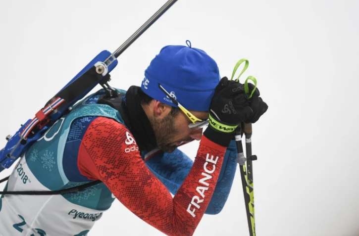 La déception du Français Martin Fourcade à l'issue de l'épreuve de l'Individuel de biathlon, le 15 février 2018 aux JO de Pyeongchang
