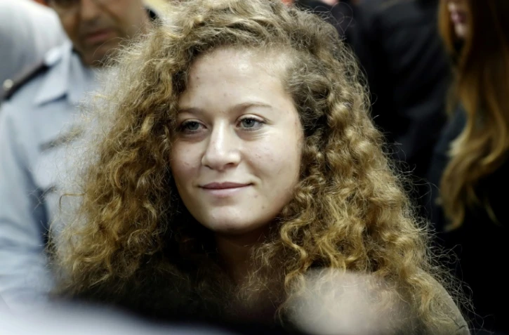 L'adolescente palestinienne Ahed Tamimi arrive au tribunal militaire d'Ofer pour l'ouverture de son procès, le 13 février 2018