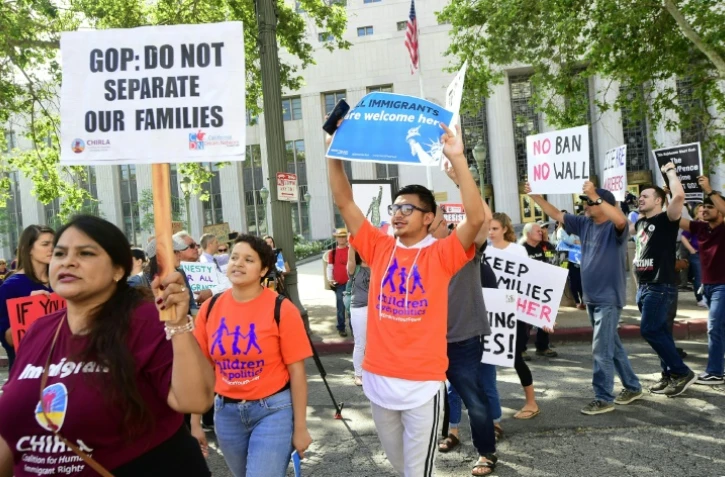 Des manifestants protestent contre la politique de "tolérance zéro" à l'immigration illégale de l'administration Trump, le 26 juin 2018 à Los Angeles (Californie, ouest)

