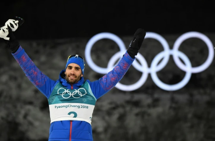 La joie du biathlète français Martin Fourcade après sa victoire à la mass start aux JO, le 18 février 2018 à Pyeongchang