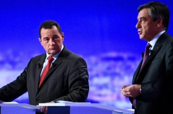 Jean-Frédéric Poisson (g) et François Fillon, lors du premier débat TV de la primaire de la droite, le  13 octobre 2016 à La Plaine-Saint-Denis