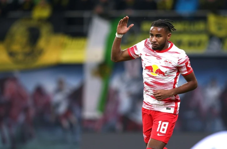 La joie du milieu de terrain français de Leipzig Christopher Nkunku, arpès avoir ouvert le score à domicile contre le Borussia Dormtund, lors de la 11e journée de Bundesliga, le 7 novembre 2021