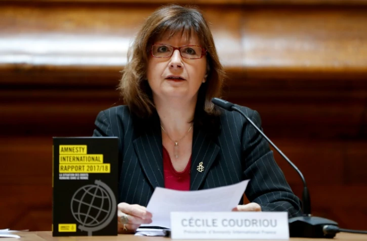 La présidente d'Amnesty international France, Cécile Coudriou, lors d'une conférence de presse à Paris, le 21 février 2018