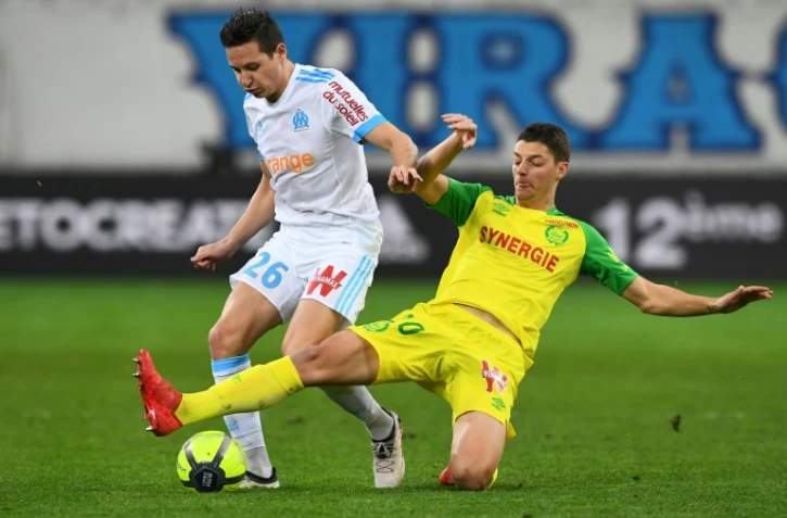 Le milieu de terrain de l'OM Florian Thauvin (G) buteur lors de la réception de Nantes en 28e journée de L1 le 4 mars 2018