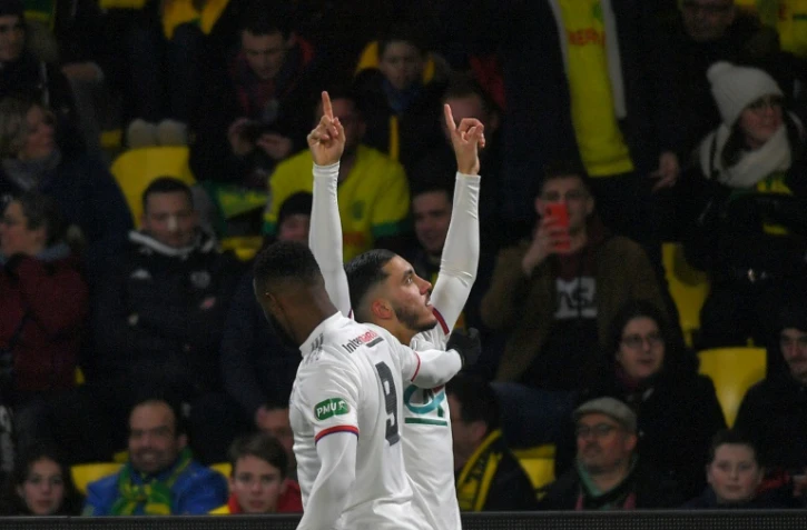Les attaquants de Lyon Moussa Dembélé et Rayan Cherki, auteurs de trois des quatre buts contre Nantes, en Coupe de France, le 18 janvier 2020 à La Beaujoire