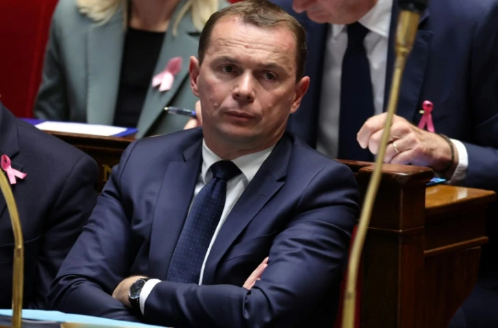 Le ministre du Travail Olivier Dussopt, le 3 octobre 2023 lors de questions au gouvernement à l'Assemblée, à Paris