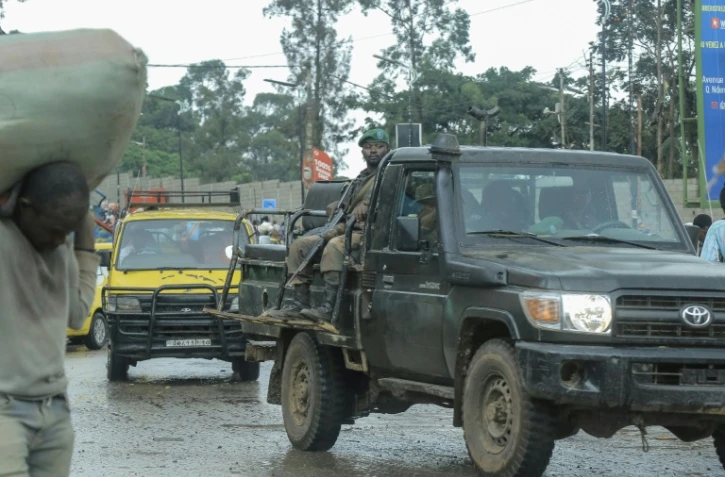 Des soldats des Forces armées de la République démocratique du Congo (FARDC)en pick-up dans une rue de Bukavu, le 14 février 2025