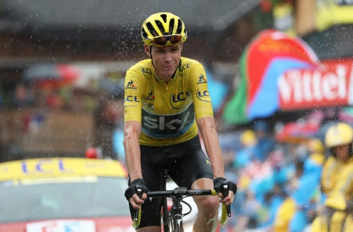 Le Britannique Chris Froome (Sky) franchit la ligne d'arrivée de la 20e étape du Tour de France 2016, à Morzine-Avoriaz dans les Alpes, le 23 juillet 2016