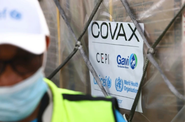 La première cargaison de vaccin de l'initiative Covax arrive à l'aéroport d'Accra, le 24 février 2021