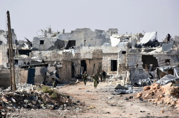 Des forces pro-gouvernementales syriennes dans le village de Minyan, près d'Alep, le 12 novembre 2016