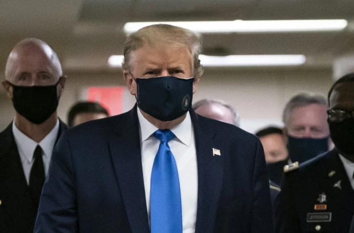 Le président américain Donald Trump visite un hôpital militaire à Bethesda, près de Washington, le 11 juillet 2020