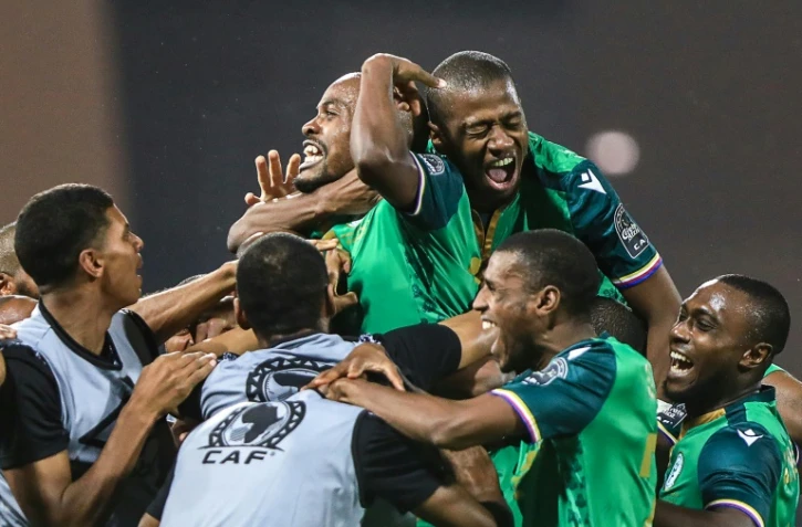 La joie de l'attaquant des Comores, Ahmed Mogni, après avoir marqué le 2e but contre le Ghana, lors de leur match du groupe C de la Coupe d'Afrique des nations, le 18 janvier 2022 à Garoua (Cameroun)