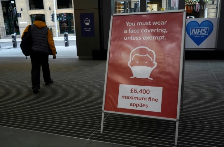 Panneau pour rappeler l'obligation de porter un masque à Londres, le 2 janvier 2021