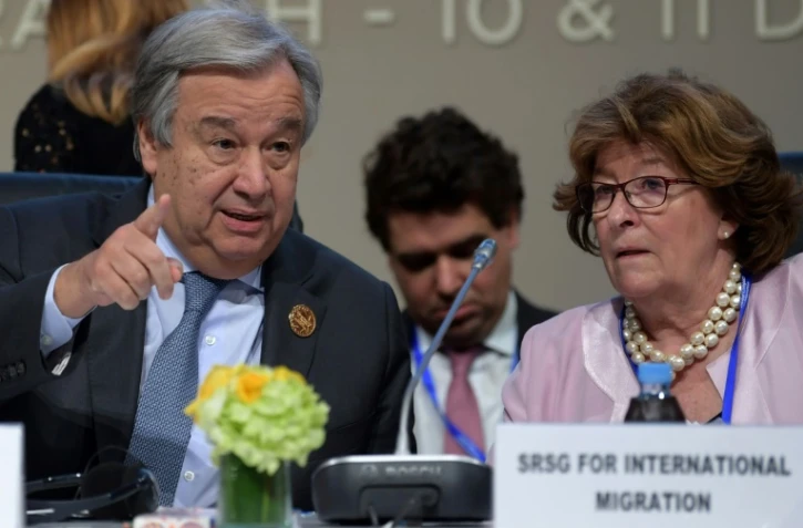 Le secrétaire général de l'ONU Antonio Guterres et Louise Arbour, Représentante spéciale du Secrétaire général pour les migrations internationales, pendant la conférence de Marrakech le 10 décembre 2018