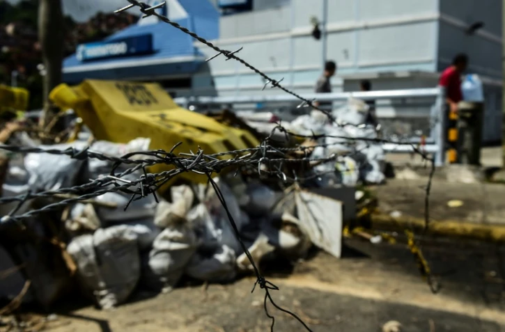 Une barricade mise en place par les opposants au président vénézuélien Nicolas Maduro le 29 juillet 2017