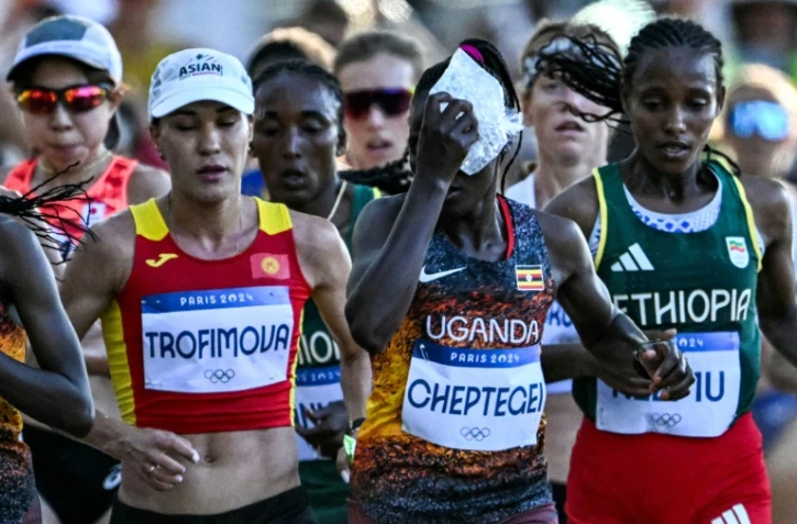 L'athlète ougandaise Rebecca Cheptegei (c) lors du marathon féminin de l'épreuve d'athlétisme des Jeux olympiques de Paris 2024, le 11 août 2024 à Paris