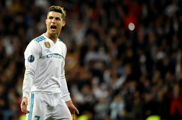 L'attaquant vedette du Real Madrid Cristiano Ronaldo exulte après avoir inscrit un but en quarts retour de C1 à Santiago Bernabeu, le 11 avril 2018   