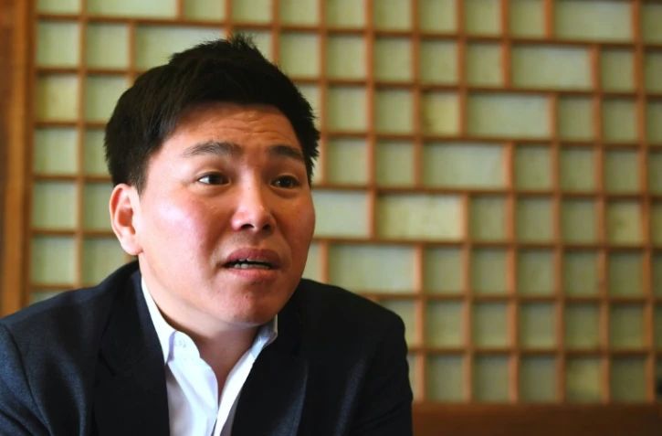 Joo Seung-hyeon, ancien soldat d'élite de l'armée nord-coréenne qui a fait défection, lors d'une interview avec l'AFP, le 26 mars 2018 dans un café à Séoul