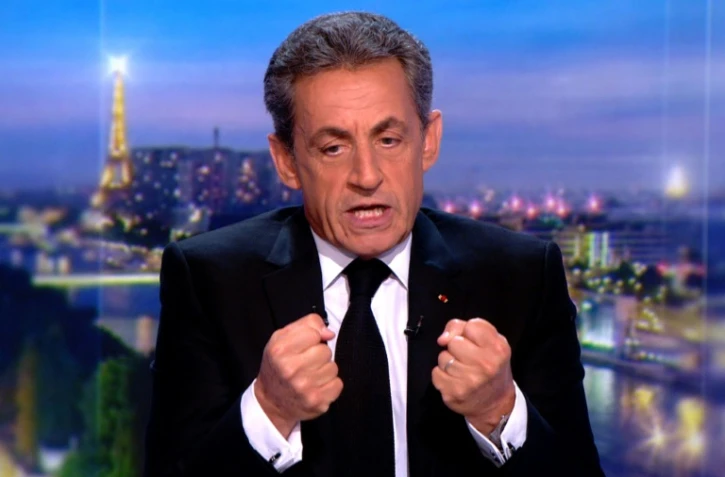 Capture d'écran de l'ex-président français Nicolas Sarkozy lors de son passage sur le plateau de TF1 le 22 mas 2018